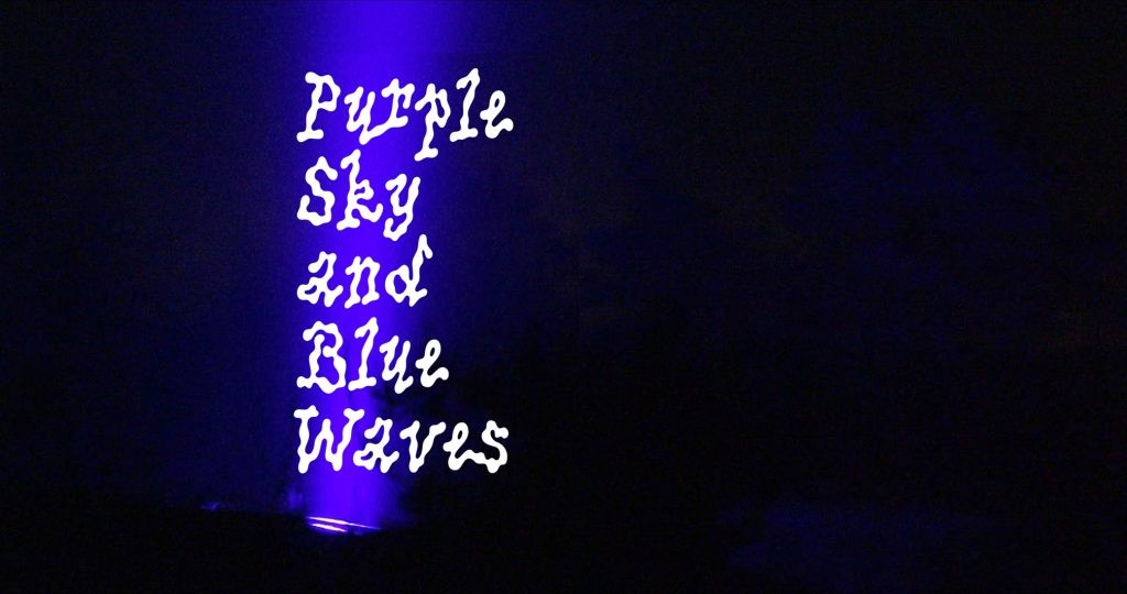 Purple Sky and Blue Waves